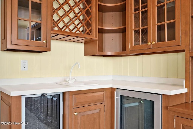 kitchen with wine cooler and sink