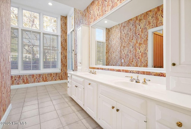 bathroom featuring tile patterned floors and vanity