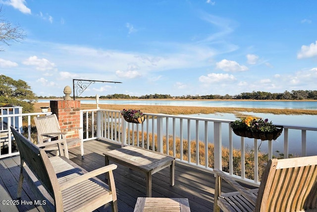 deck featuring a water view