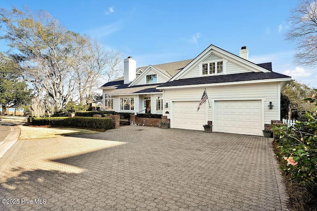 view of front of property featuring a garage