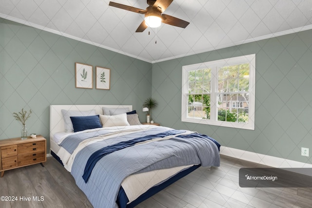 bedroom with ceiling fan, dark hardwood / wood-style flooring, and ornamental molding