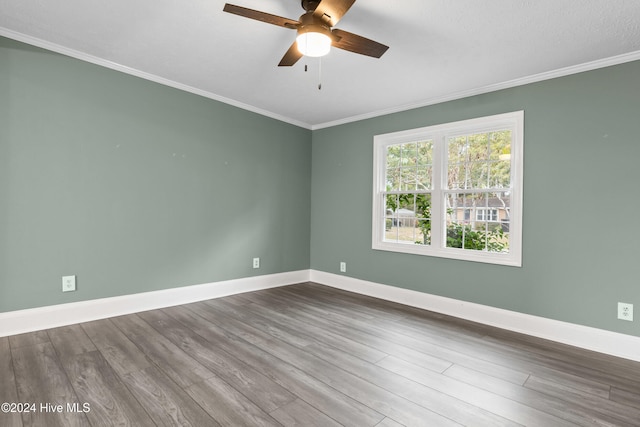 unfurnished room featuring ceiling fan, crown molding, wood-type flooring, and a textured ceiling