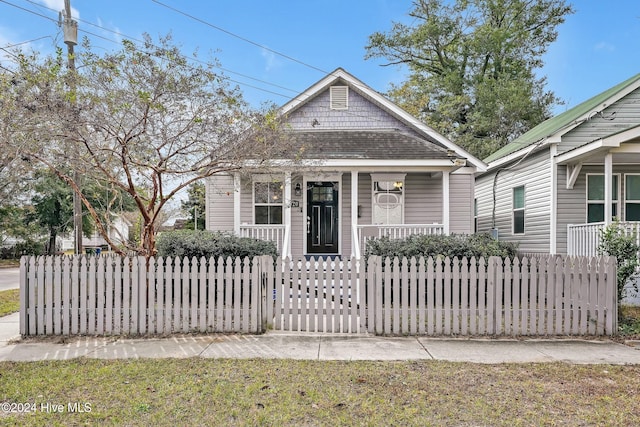 bungalow-style house featuring covered porch