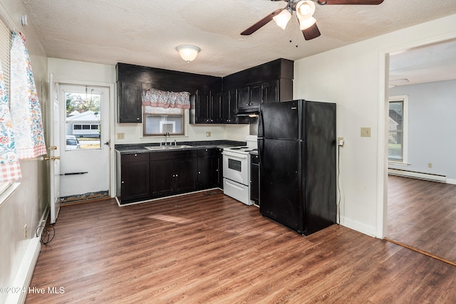 kitchen featuring black refrigerator, a textured ceiling, white range with electric stovetop, sink, and wood-type flooring