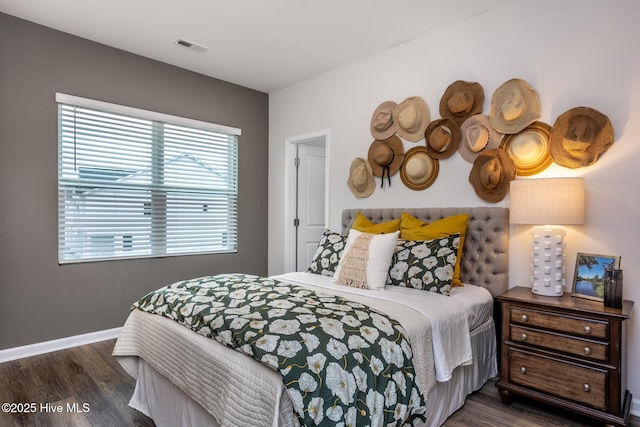 7126 Fisk Dr, Leland, NC 28451 - bedroom featuring wood finished floors and baseboards