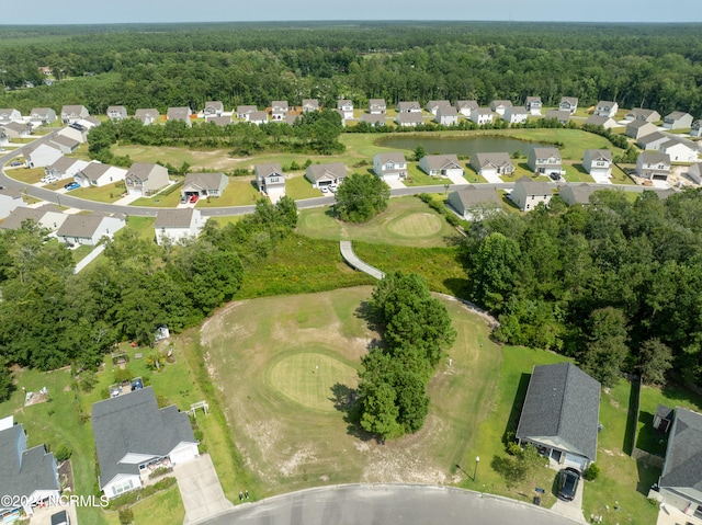 bird's eye view with a residential view and a wooded view