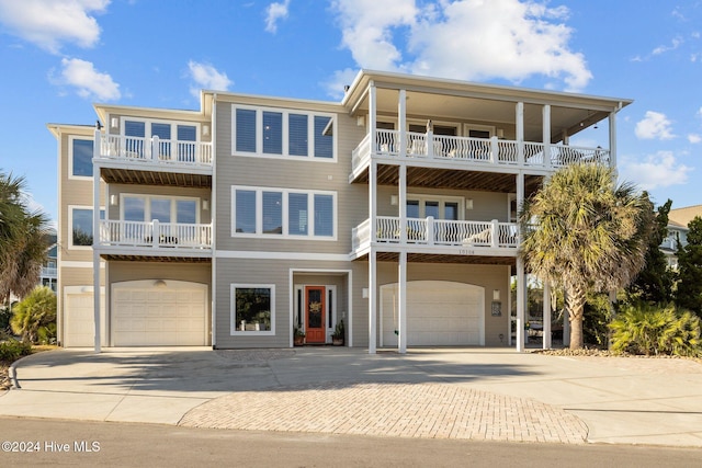 coastal inspired home with a garage