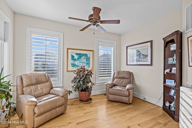 10108 Sea Breeze Dr, Emerald Isle, NC 28594 - living area with ceiling fan and wood finished floors