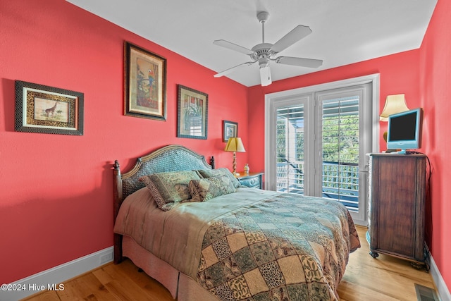 10108 Sea Breeze Dr, Emerald Isle, NC 28594 - bedroom with wood finished floors, access to exterior, and ceiling fan