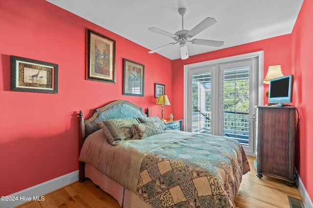 bedroom featuring ceiling fan and light hardwood / wood-style flooring