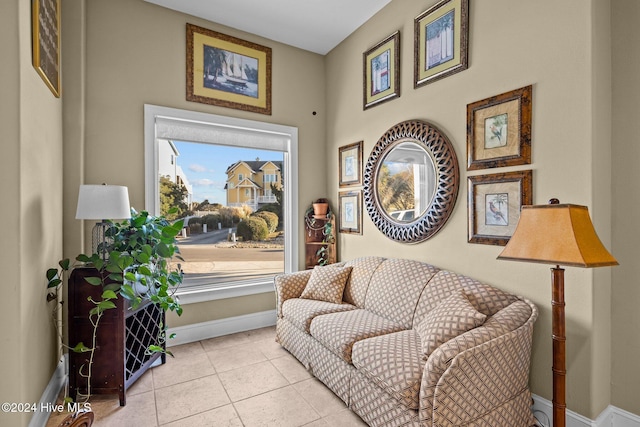 living area with light tile patterned floors