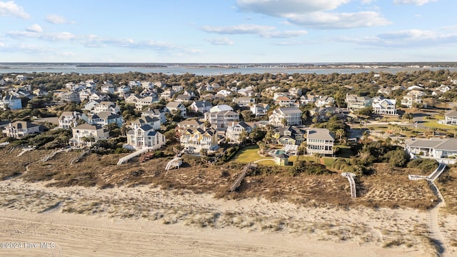 10108 Sea Breeze Dr, Emerald Isle, NC 28594 - aerial perspective of suburban area featuring a large body of water