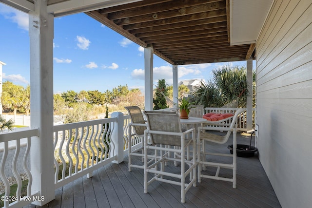 10108 Sea Breeze Dr, Emerald Isle, NC 28594 - wooden deck featuring outdoor dining space