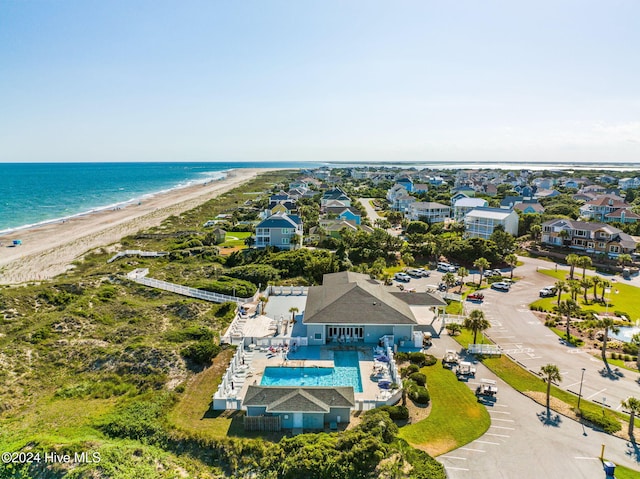 bird's eye view featuring a beach view and a water view