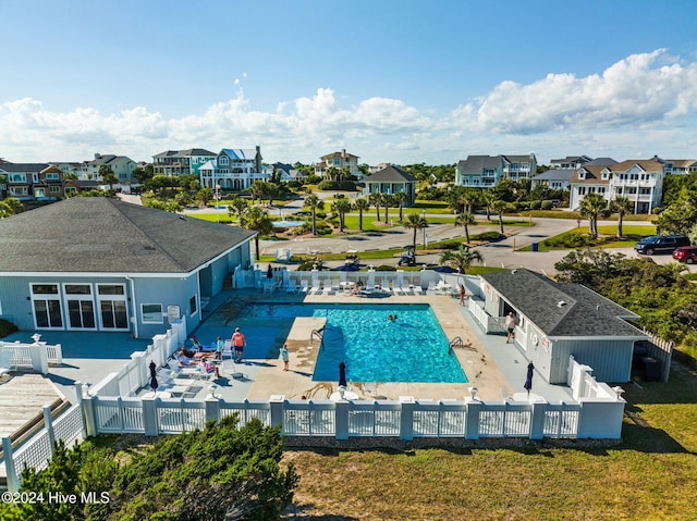 10108 Sea Breeze Dr, Emerald Isle, NC 28594 - community pool featuring a fenced backyard, a residential view, and a patio area