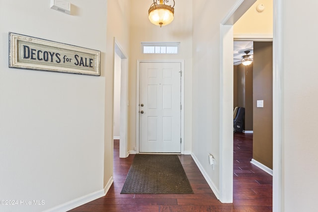864 Sandpiper Bay Dr SW, Sunset Beach, NC 28468 - foyer entrance with dark wood-type flooring and a ceiling fan