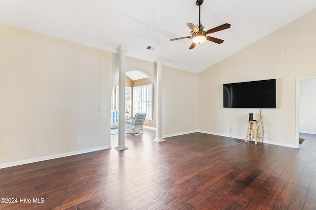 864 Sandpiper Bay Dr SW, Sunset Beach, NC 28468 - unfurnished living room with ornate columns, a ceiling fan, dark wood-style flooring, arched walkways, and high vaulted ceiling