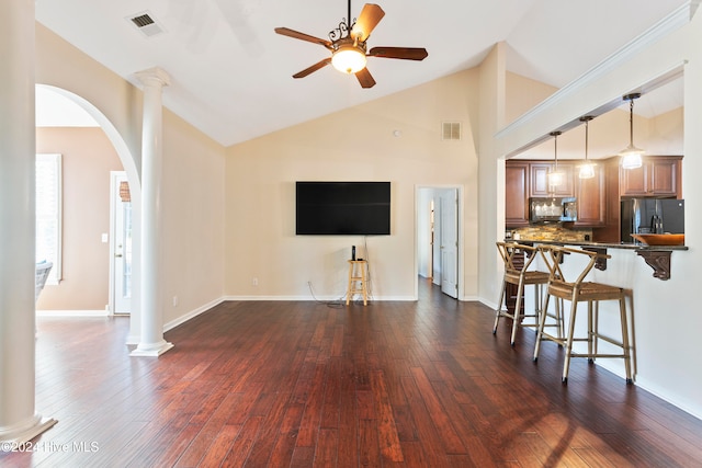 living room featuring ornate columns, ceiling fan, high vaulted ceiling, and dark hardwood / wood-style floors