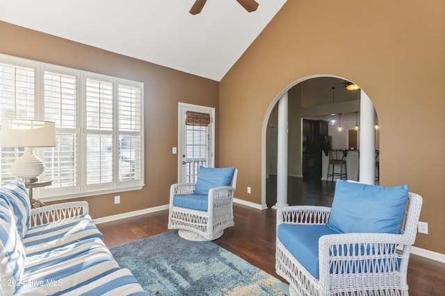 864 Sandpiper Bay Dr SW, Sunset Beach, NC 28468 - living room with a ceiling fan, arched walkways, wood finished floors, and high vaulted ceiling
