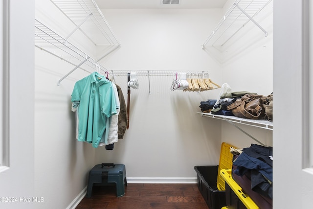 864 Sandpiper Bay Dr SW, Sunset Beach, NC 28468 - walk in closet featuring wood finished floors
