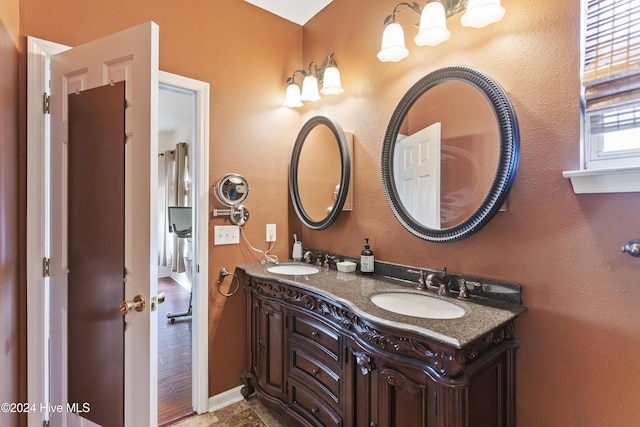 864 Sandpiper Bay Dr SW, Sunset Beach, NC 28468 - full bathroom with double vanity and baseboards