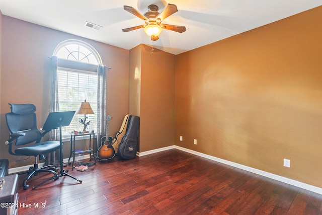 office area featuring dark hardwood / wood-style flooring, ceiling fan, and a healthy amount of sunlight