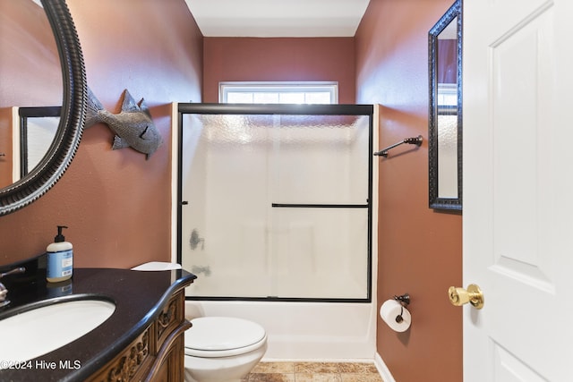864 Sandpiper Bay Dr SW, Sunset Beach, NC 28468 - full bath featuring vanity, bath / shower combo with glass door, and tile patterned flooring