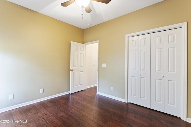 864 Sandpiper Bay Dr SW, Sunset Beach, NC 28468 - unfurnished bedroom with dark wood finished floors, a closet, and ceiling fan