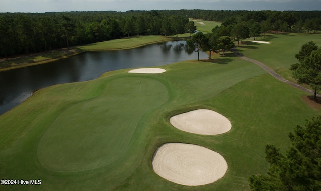 surrounding community with a water view