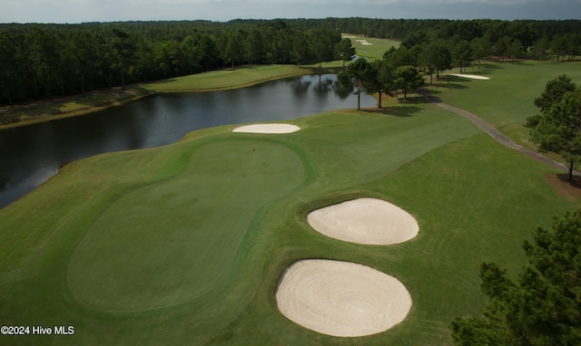 864 Sandpiper Bay Dr SW, Sunset Beach, NC 28468 - surrounding community featuring a view of trees, a water view, and golf course view