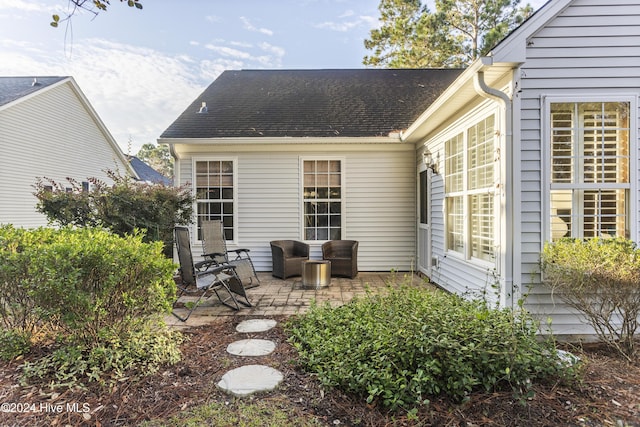 864 Sandpiper Bay Dr SW, Sunset Beach, NC 28468 - rear view of property featuring a patio area