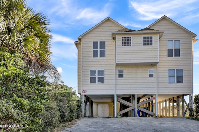 view of front of property with a carport