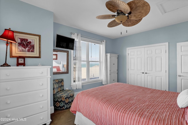 bedroom featuring carpet floors, a closet, and ceiling fan