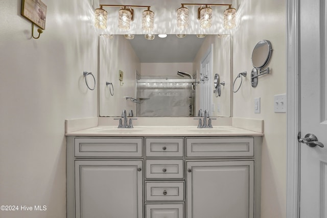 bathroom with vanity and an enclosed shower