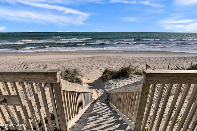 view of water feature with a beach view