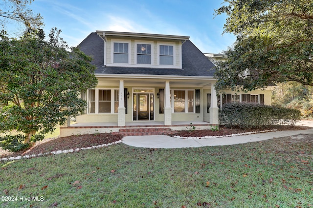 view of front of property featuring a front yard