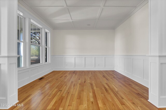 unfurnished room with light hardwood / wood-style floors