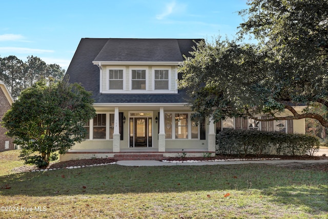 view of front of home with a front lawn