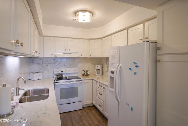 kitchen with white cabinets, dark hardwood / wood-style flooring, white appliances, and sink