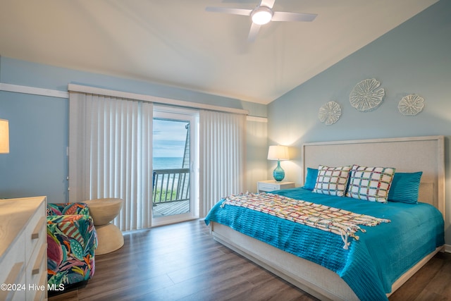 bedroom with access to outside, ceiling fan, a water view, dark hardwood / wood-style floors, and lofted ceiling