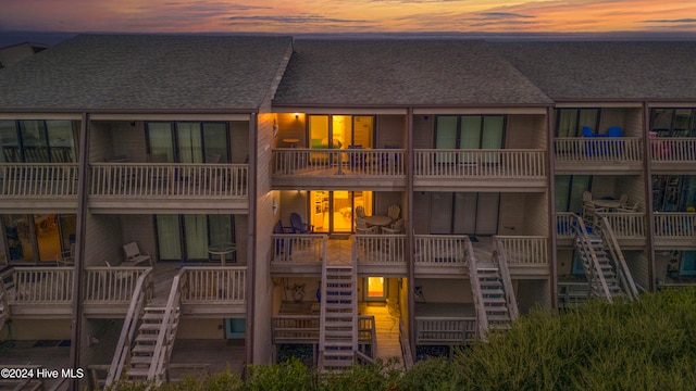 view of outdoor building at dusk