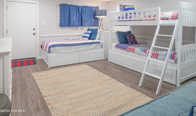 bedroom featuring hardwood / wood-style floors