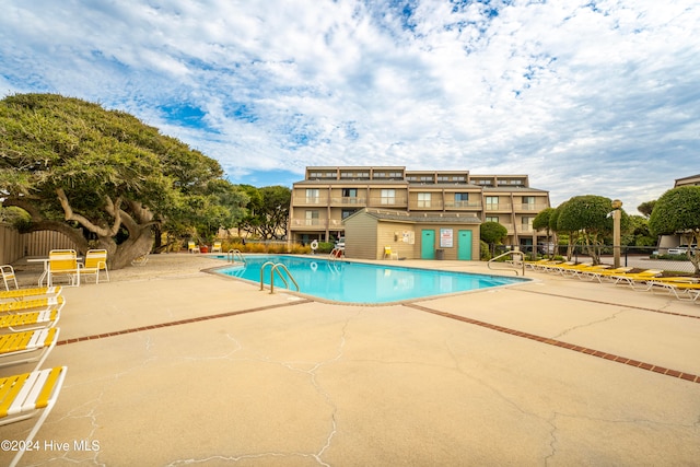 view of pool featuring a patio area