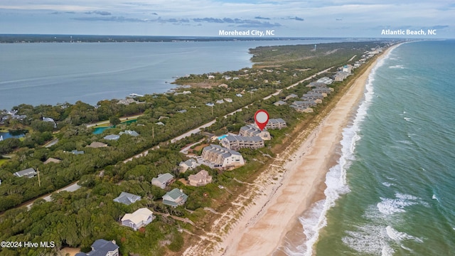 bird's eye view with a water view and a view of the beach