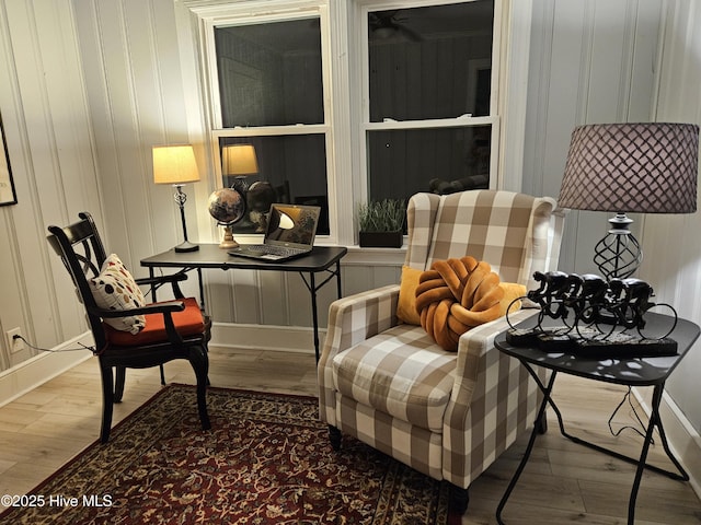 sitting room with wood finished floors