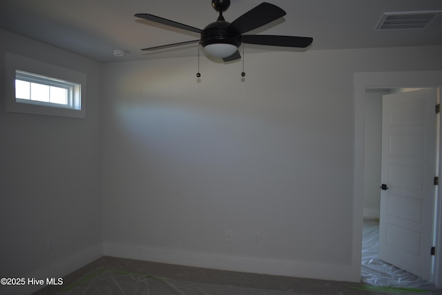 unfurnished room with ceiling fan