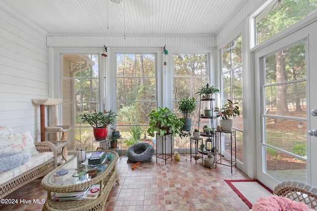 sunroom featuring a healthy amount of sunlight