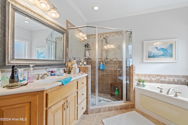 bathroom featuring separate shower and tub, tile patterned flooring, vanity, and ornamental molding