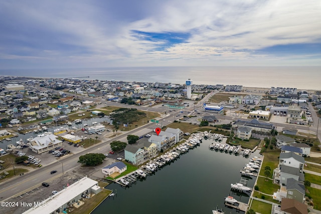 bird's eye view with a water view