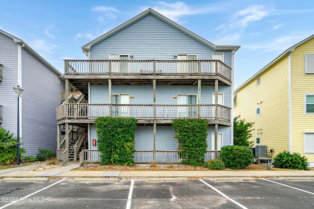 exterior space featuring a balcony and central air condition unit